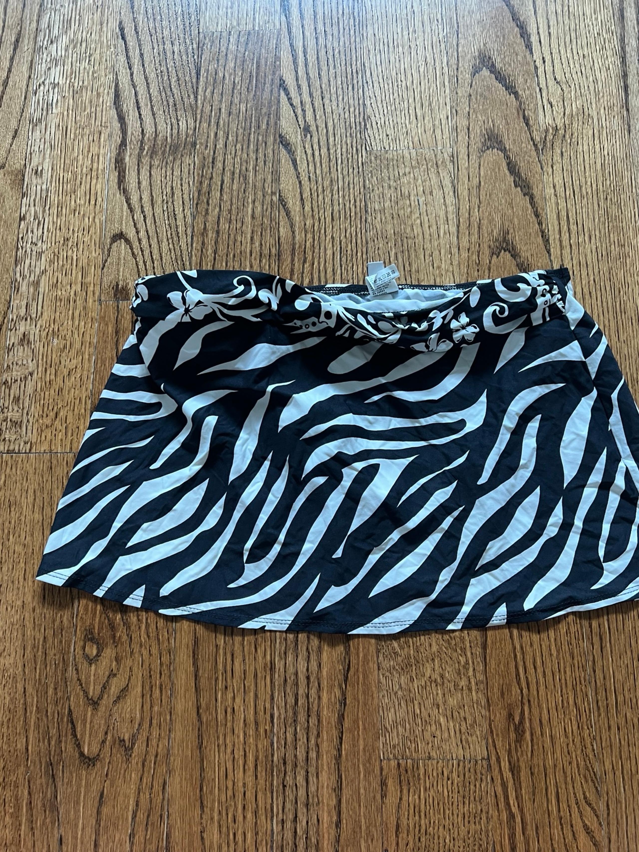 NWOT Athena swim skirt. Black white zebra and floral. Size 10