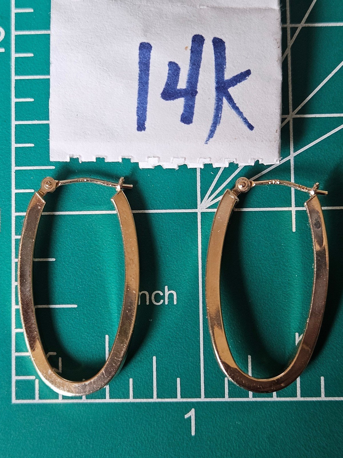 14k yellow gold solid gold oval twisted hoop earrings