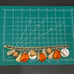 Vintage Orange Bakelite Mother of Pearl Shell Nautical Theme 7.5” Charm Bracelet