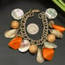 Vintage Orange Bakelite Mother of Pearl Shell Nautical Theme 7.5” Charm Bracelet