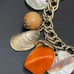 Vintage Orange Bakelite Mother of Pearl Shell Nautical Theme 7.5” Charm Bracelet