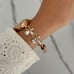Women's Gold and White Watch