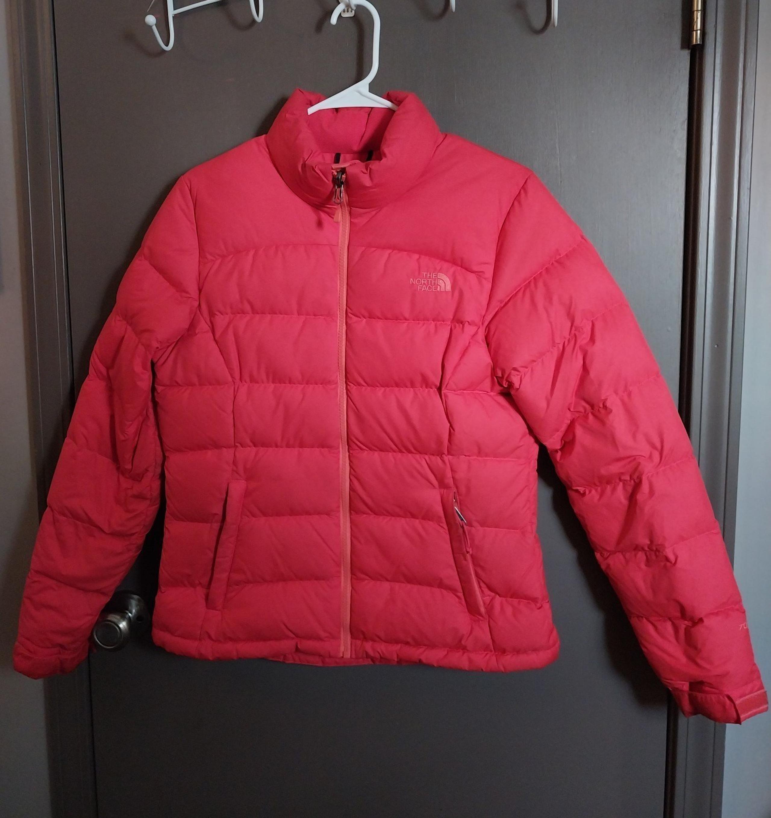The North Face red puffer jacket