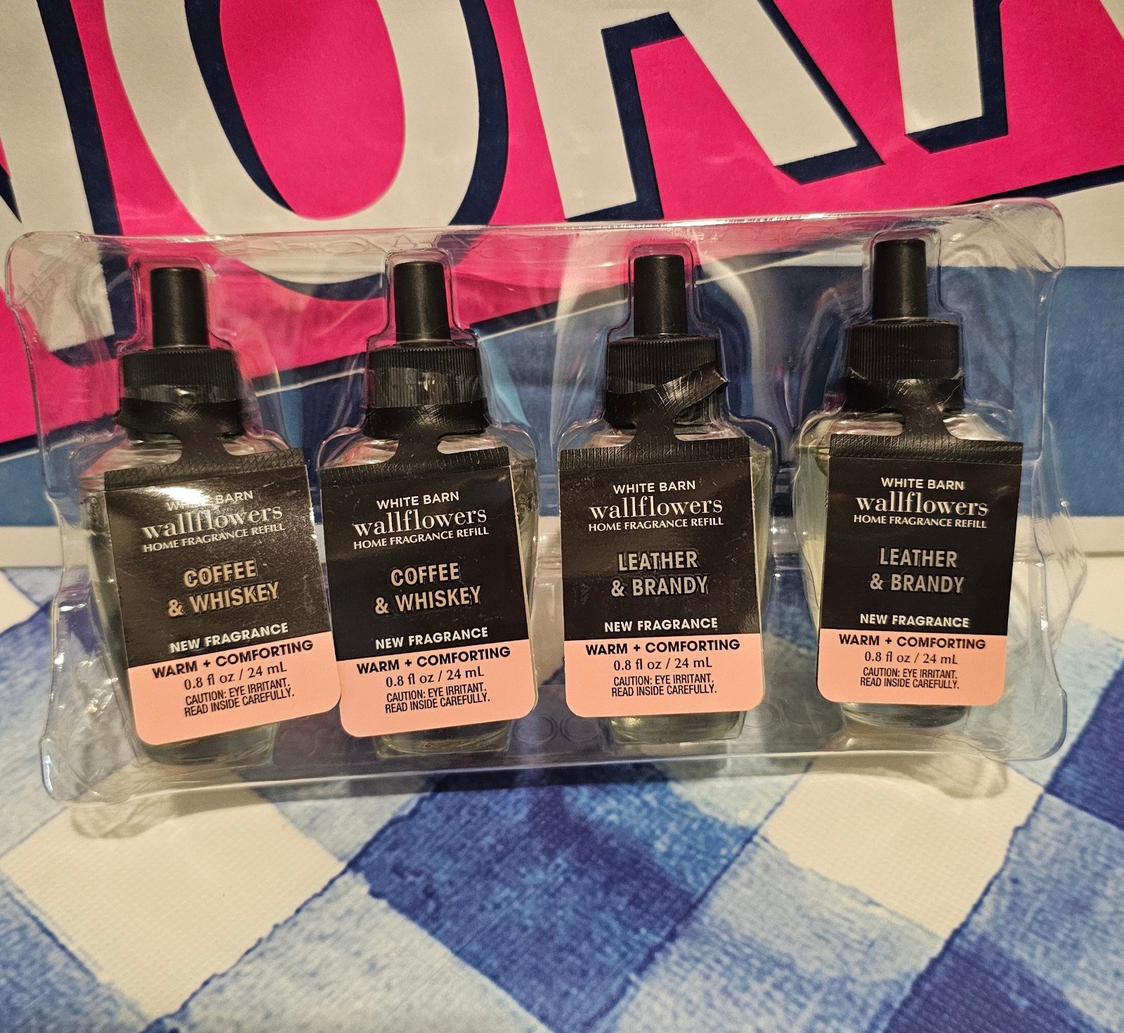 Coffee & whiskey and leather & brandy wallflower refills from bath & body works