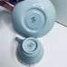 WEDGWOOD QUEEN’S WARE cream on lavender embossed teacup & saucer shell edge