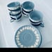 WEDGWOOD QUEEN’S WARE cream on lavender embossed teacup & saucer shell edge