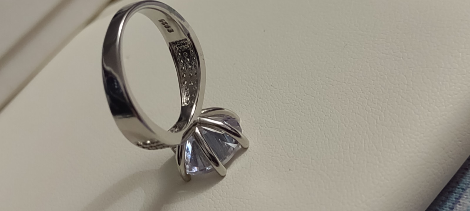 Size 8 hue of blue, 5 carat lab diamond and 925 Sterling stamp ring