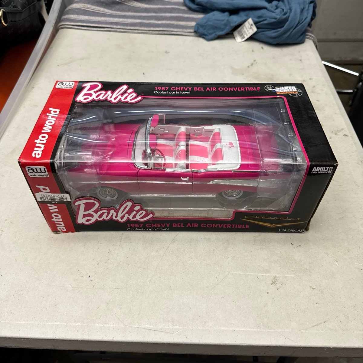 1:18 Auto World 1957 Chevrolet Bel Air Convertible Pink Barbie