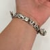 Monet silver tone charm bracelet