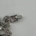 Monet silver tone charm bracelet