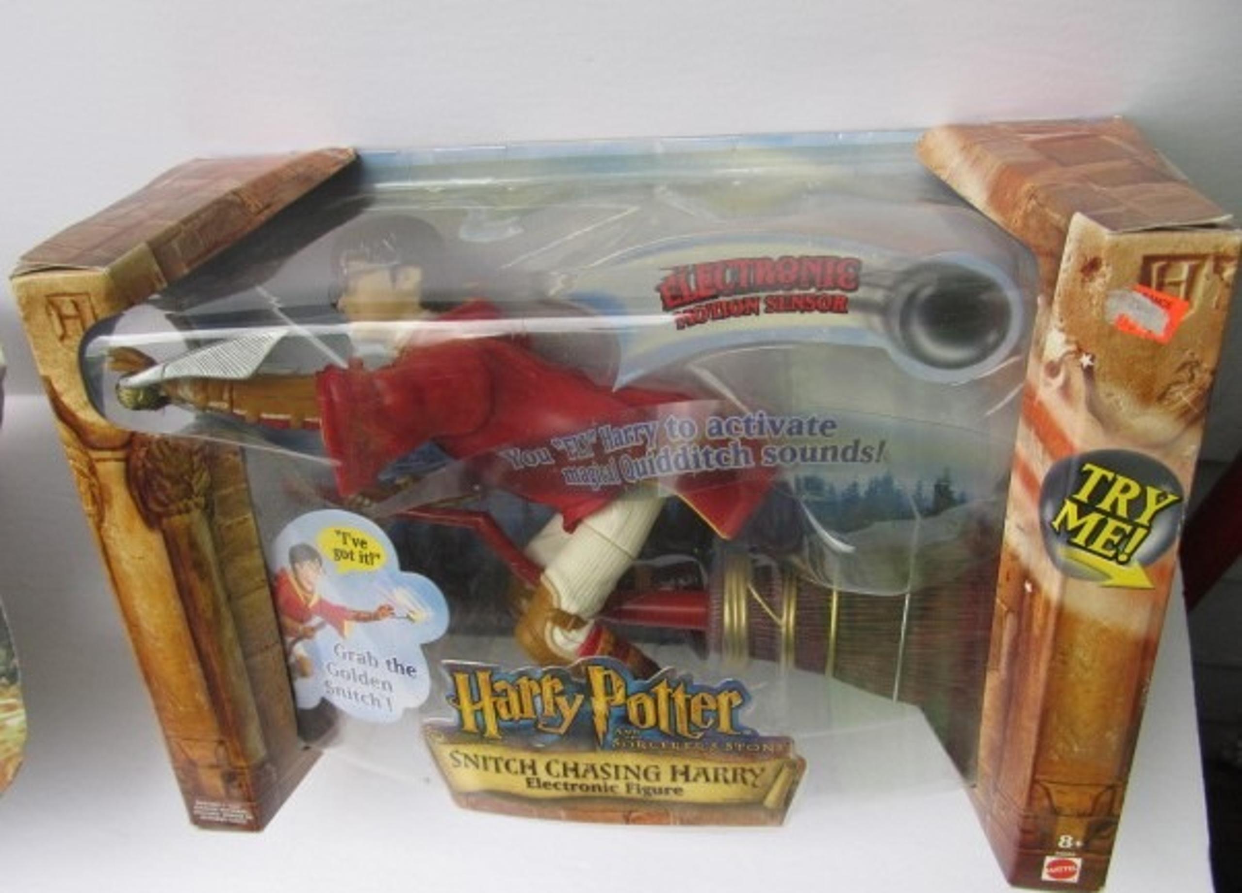 Harry Potter  "Snitch Chasing Harry Potter"  Electronic Figure New & Sealed 2001