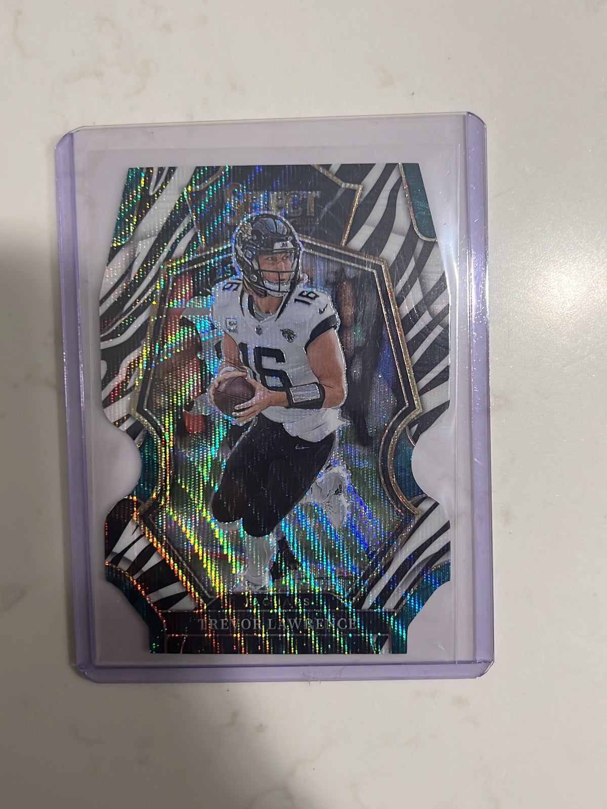 2022 Panini Select Trevor Lawrence Premier Level Zebra Die-Cut Prizm SSP #145 1E