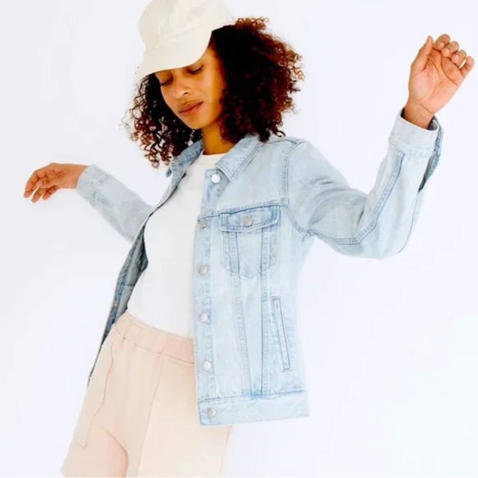 Light blue denim jacket with multiple pockets