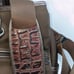 Brown tumi with croc embossed trim