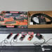 Carrera GO!!! NASCAR power slot car set - used open box. Includes two hero cards