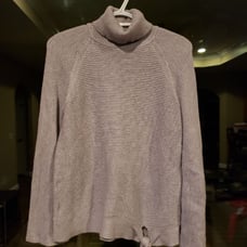 Turtleneck sweater.