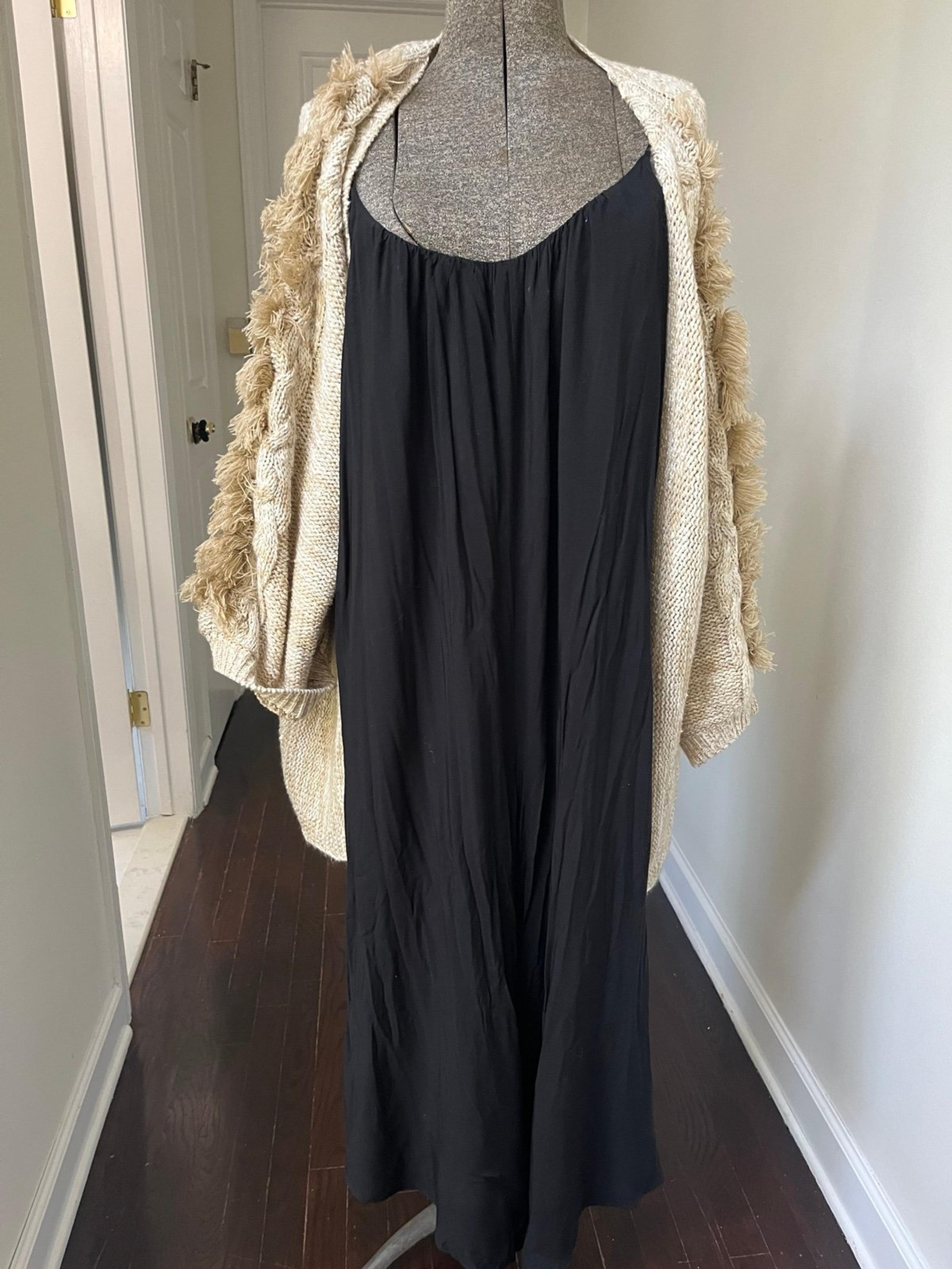 NWOT $75 retail. Silence and noise jumpsuit/romper size small.