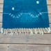 Kokopelli Blue Wool Rug With Fringe 57 x 27