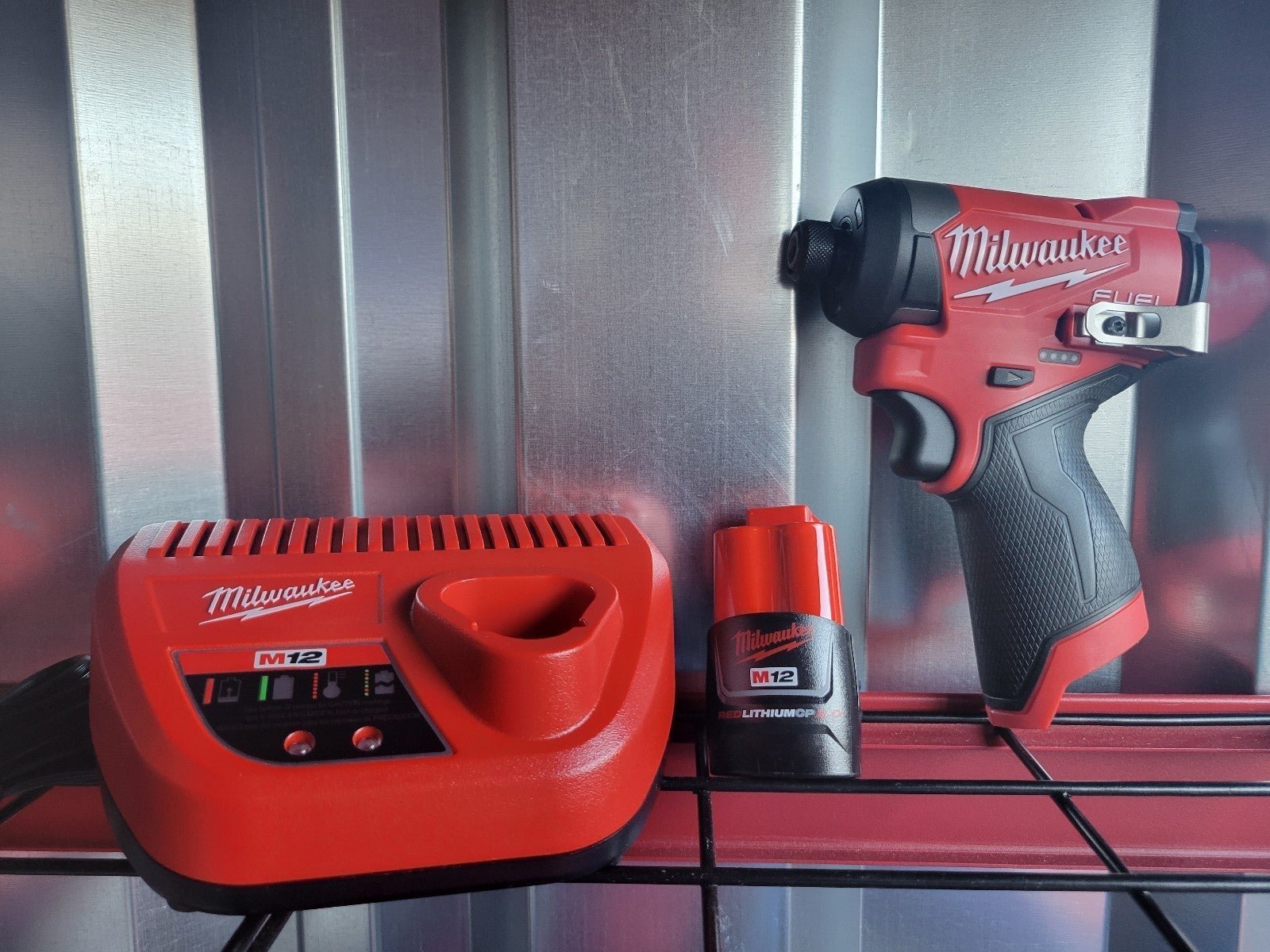 FREE BATTERY + CHARGER Milwaukee M12 FUEL impact driver