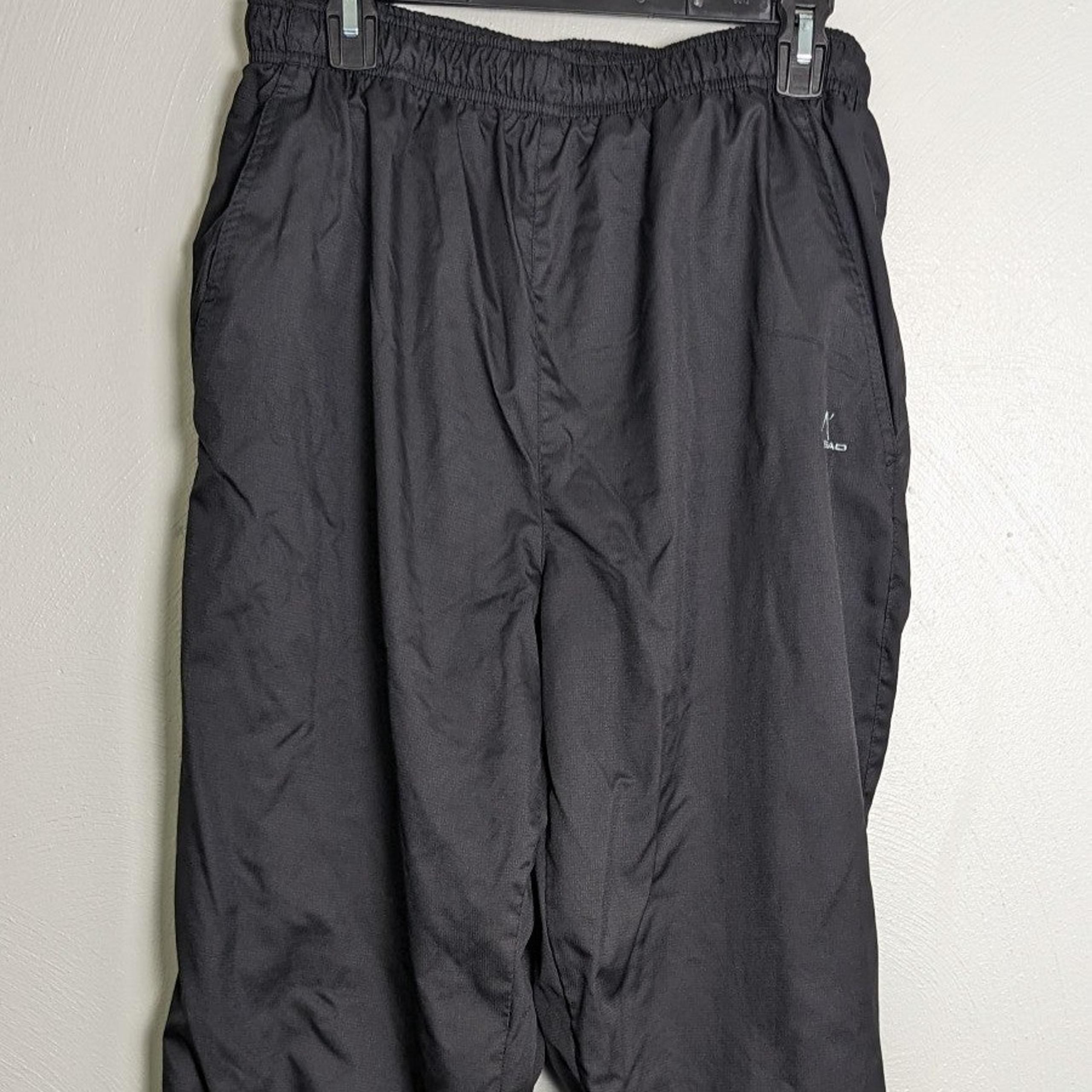 Men's black windbreaker pants by Head