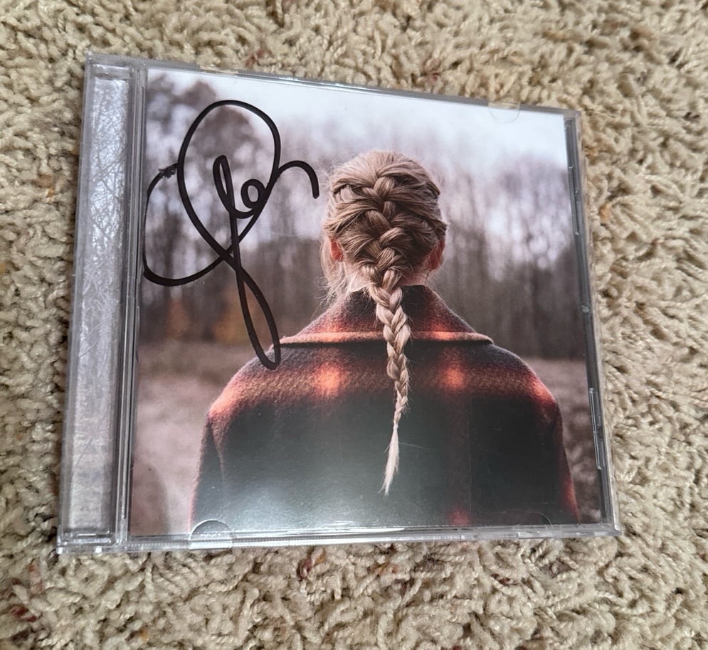 Taylor Swift evermore signed cd