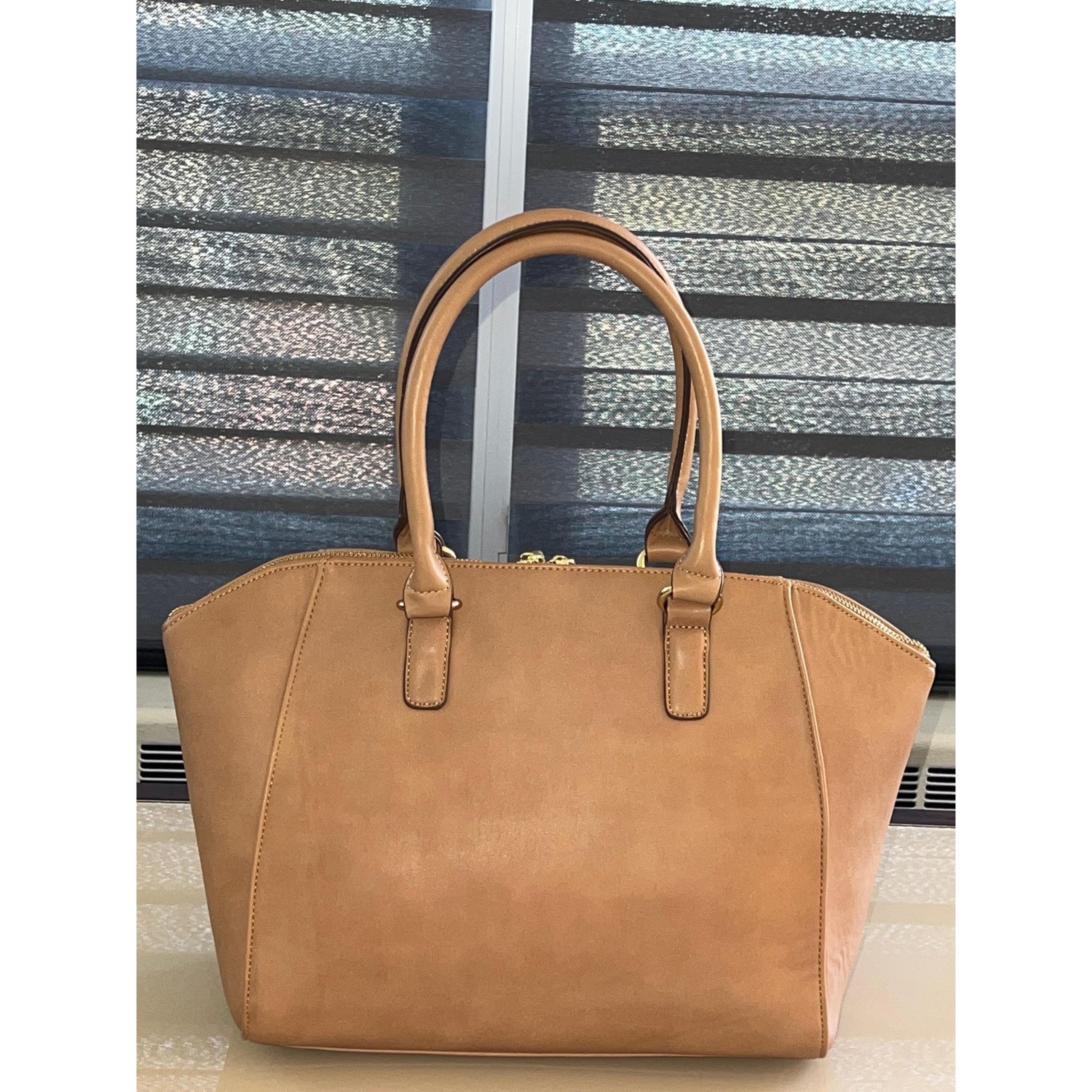 Charming Charlie Beige / Tan Color
Structure Hand Bag NWOT