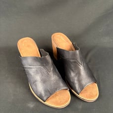 Tom’s leather mules