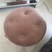 Small pink suede material chair with shoe rack