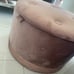 Small pink suede material chair with shoe rack