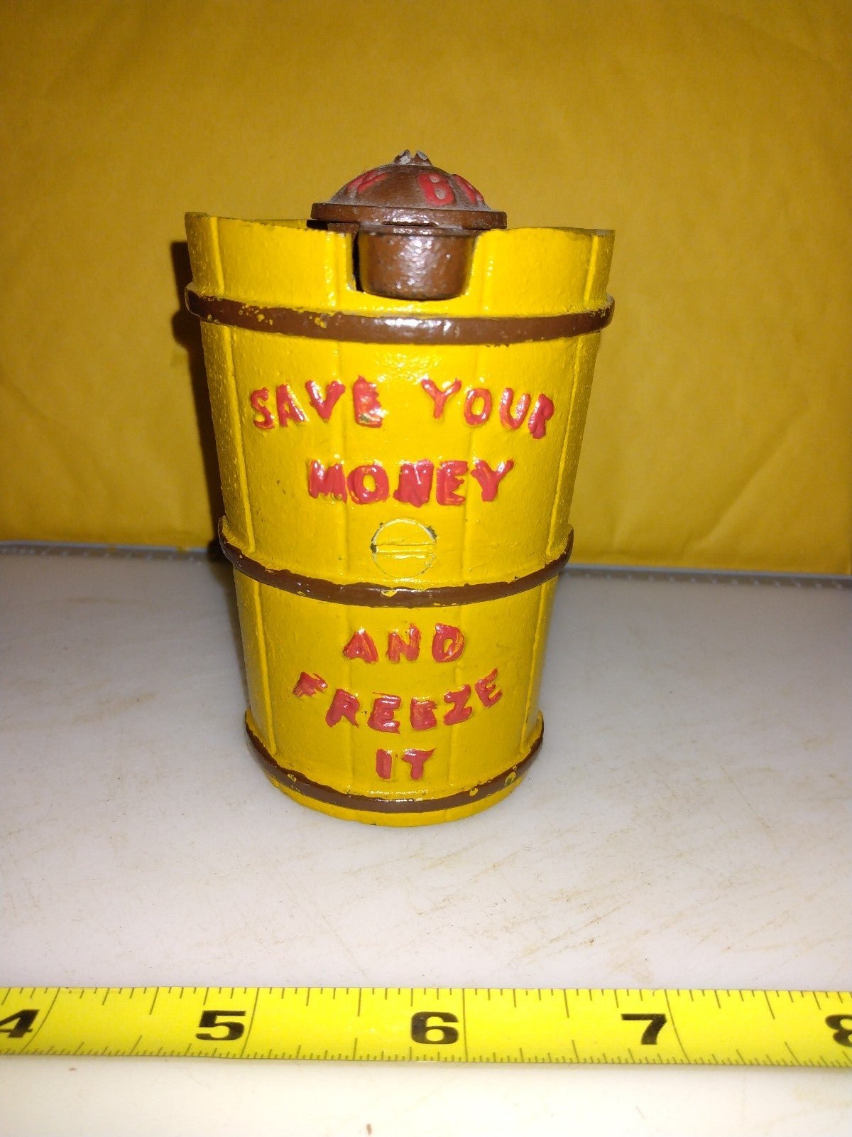 Vintage Cast Iron Ice Cream Churn Bank. Save your money and Freeze it.