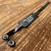 Brand new, unused Undercover 2006SS T-period wristband in black.