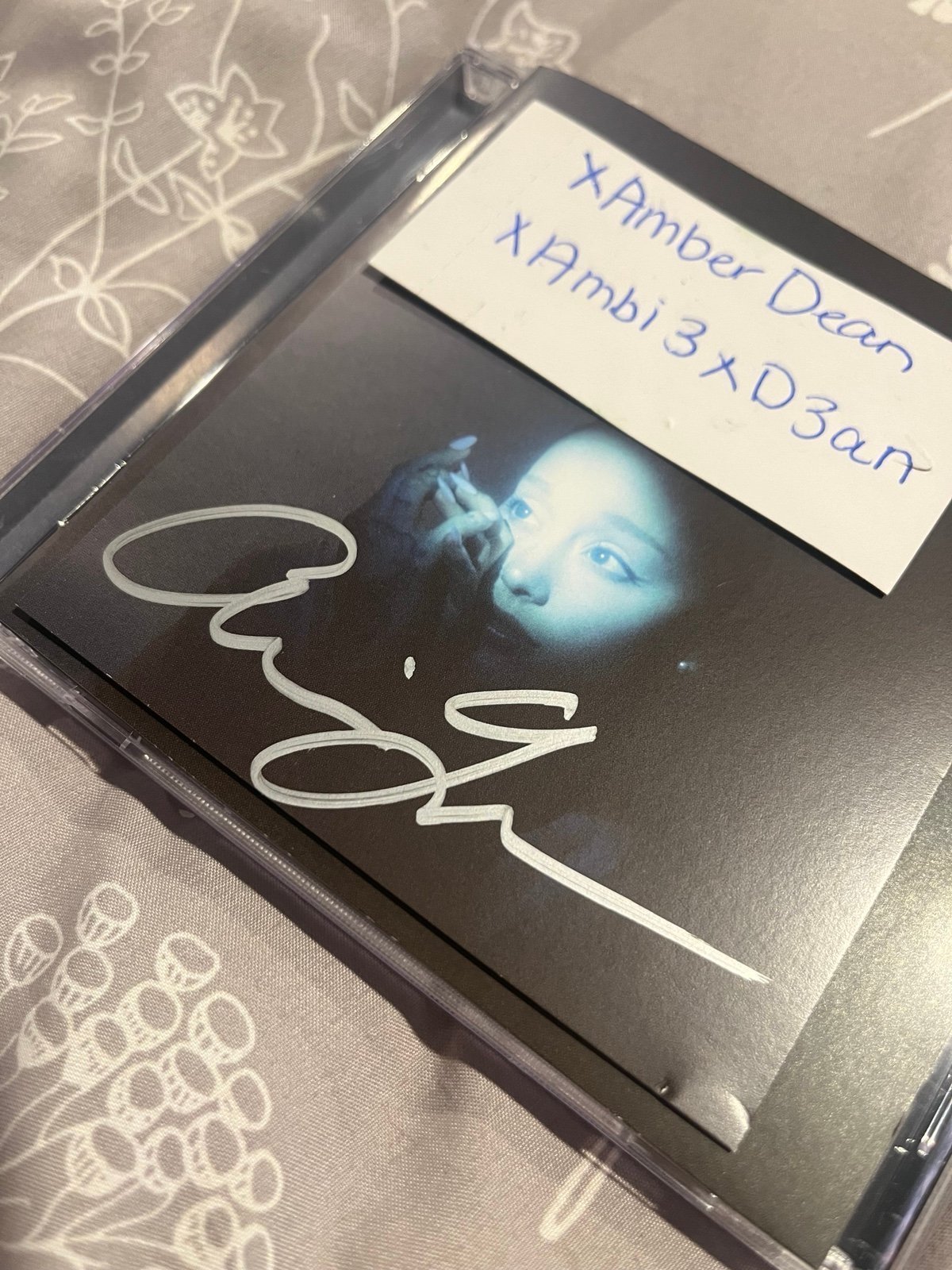 Ariana Grande deluxe signed CD in silver