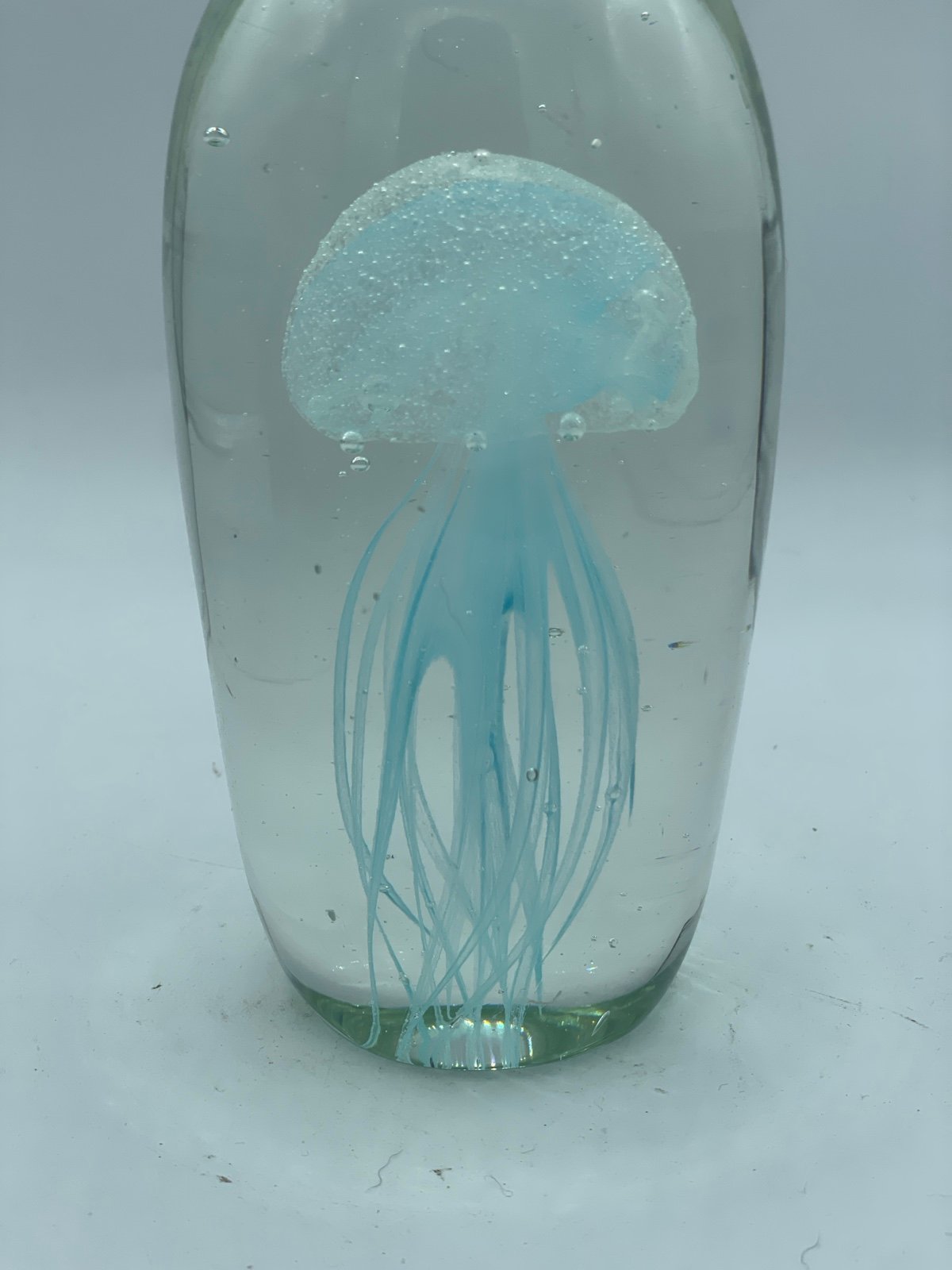 Jelly fish paper weight glows under black light