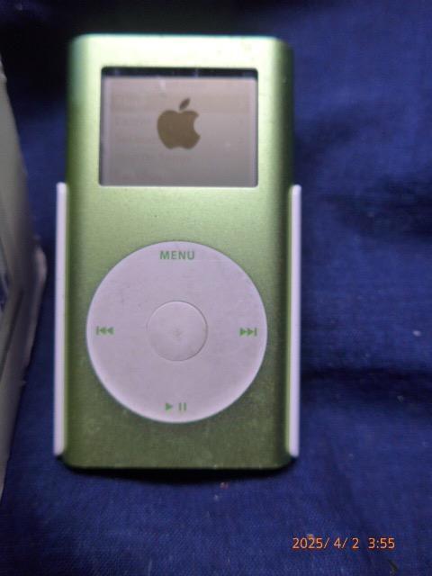 This is a good condition iPod mini. It comes with the original box.