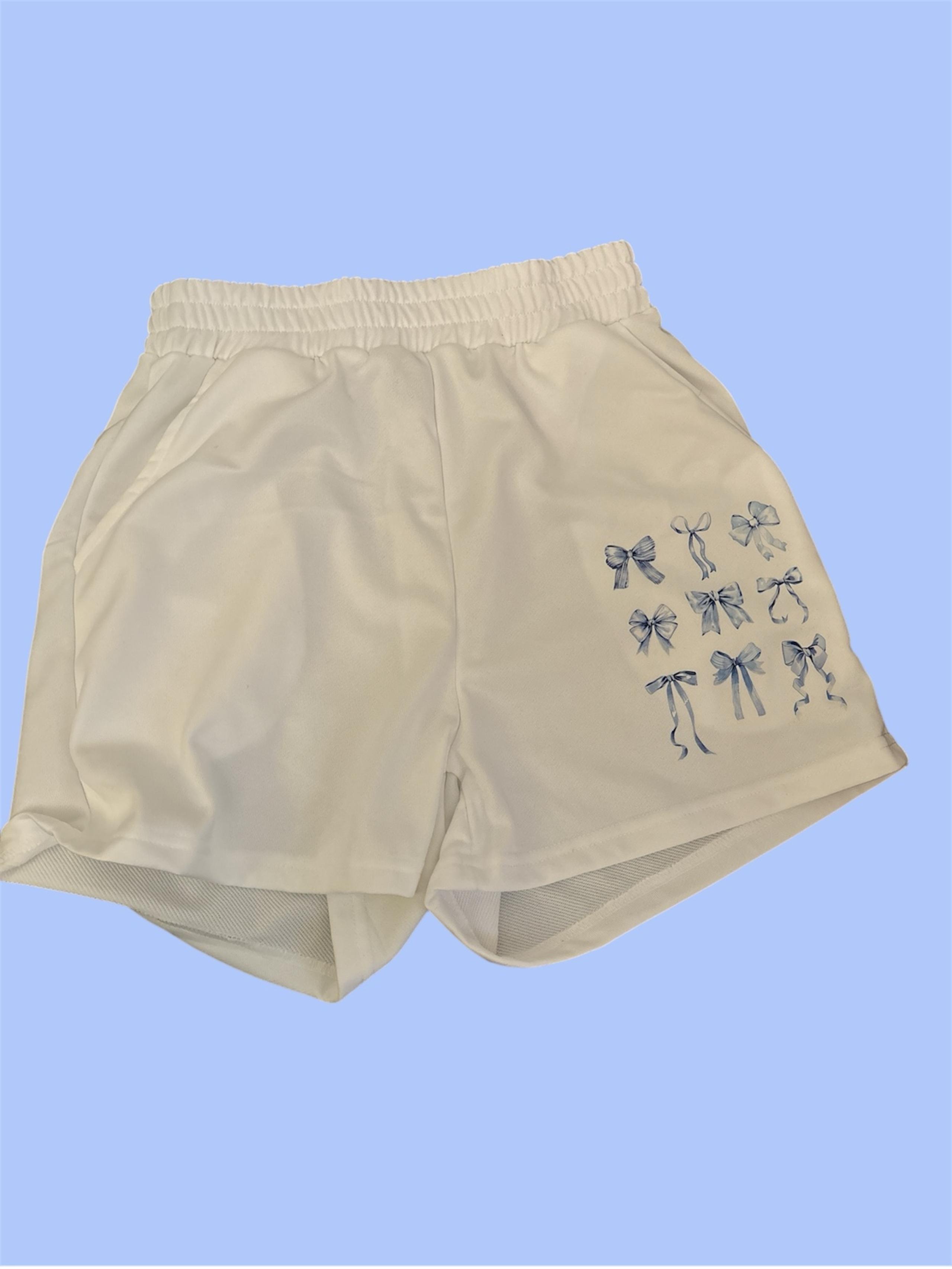 White shorts with bow design