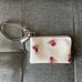 COACH Corner Zip Wristlet in Floral Print Coated Canvas