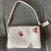 COACH Corner Zip Wristlet in Floral Print Coated Canvas