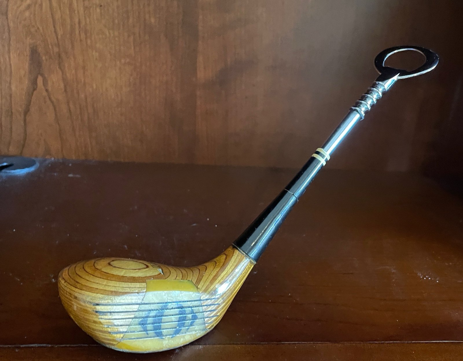 Golf club bottle opener