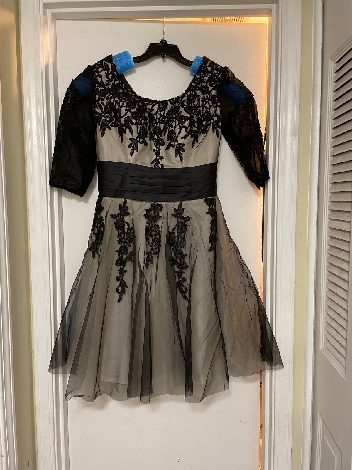 Cream and black formal dress
