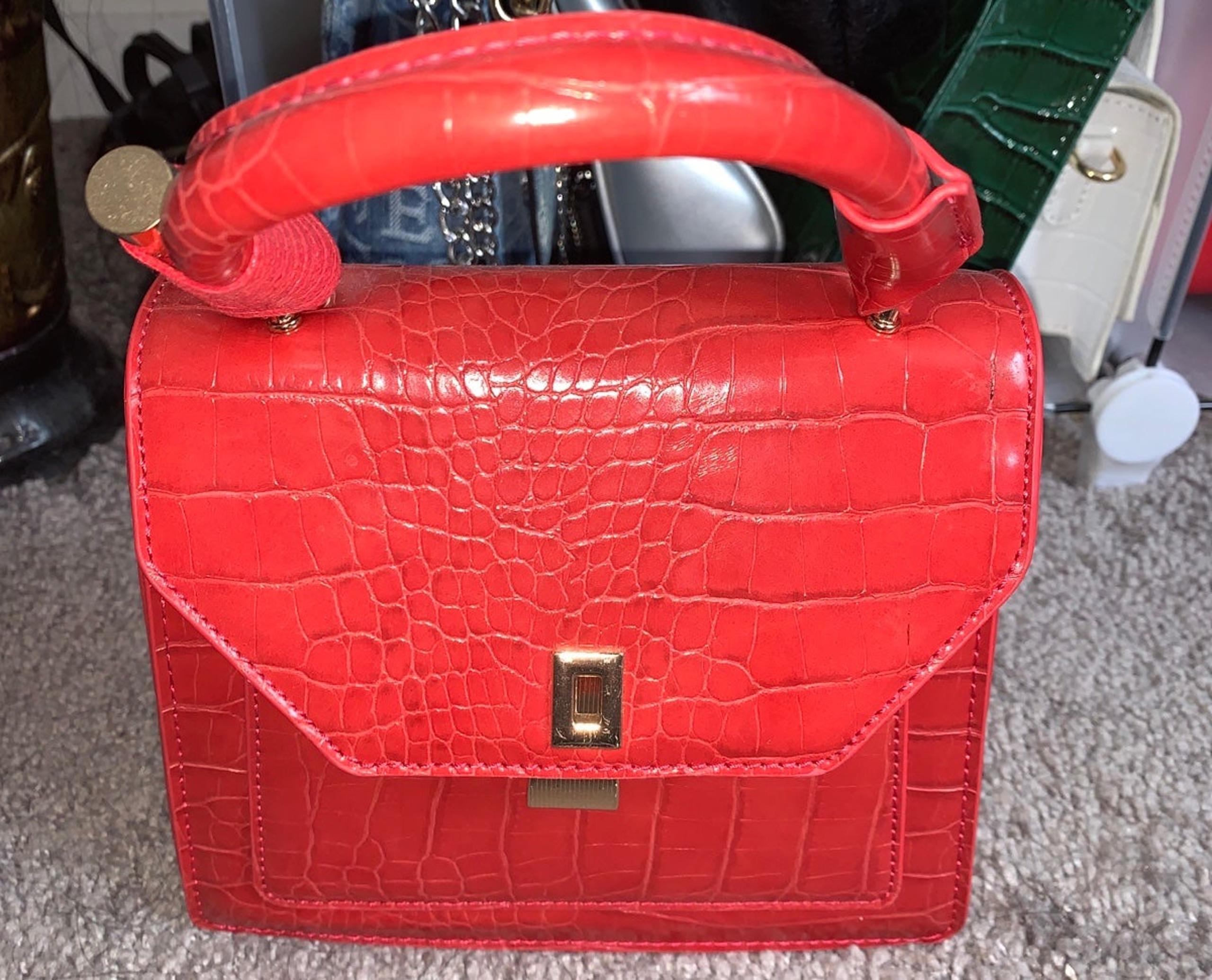Red snake skin bag