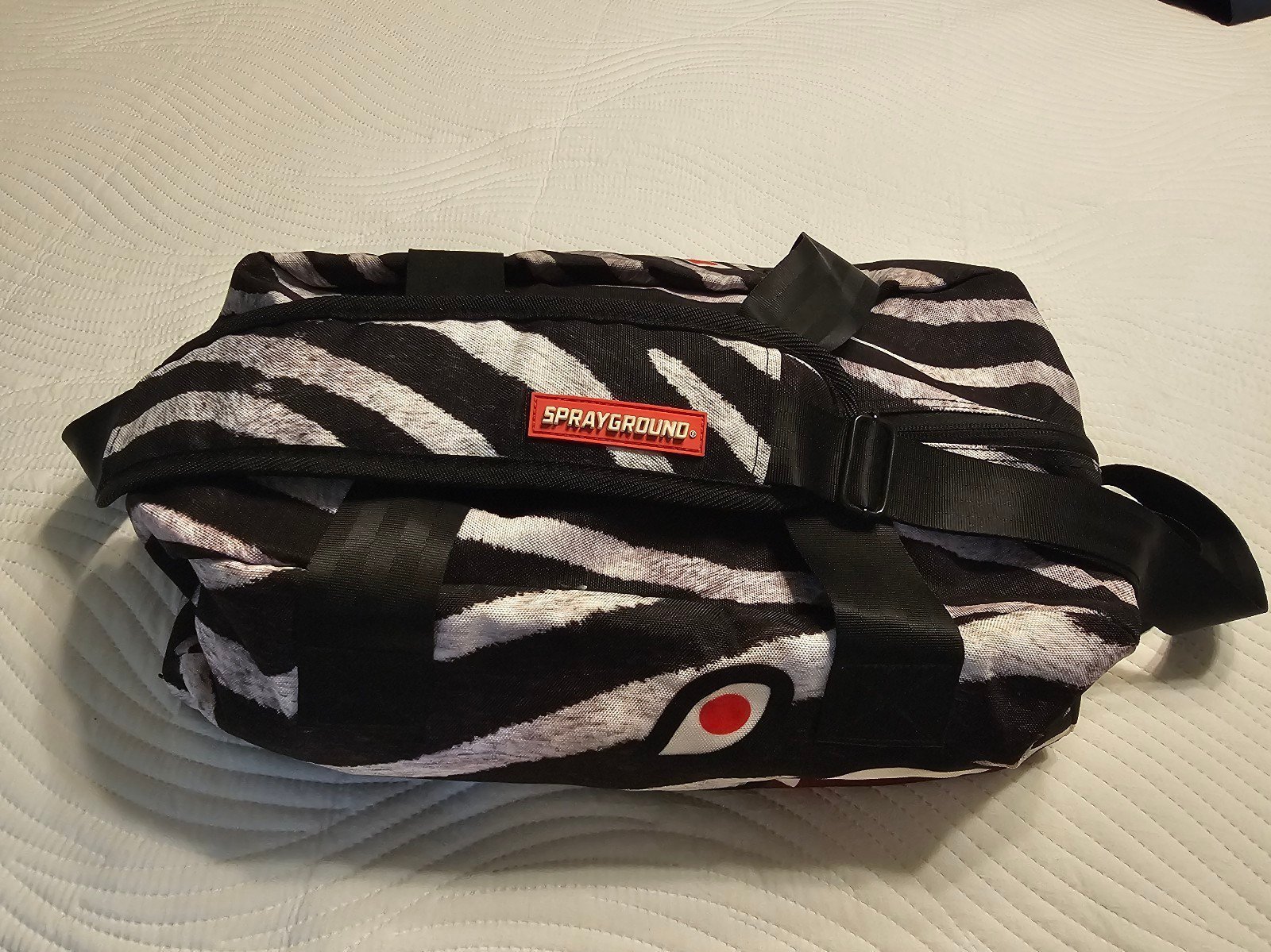 Sprayground gym duffel bag.