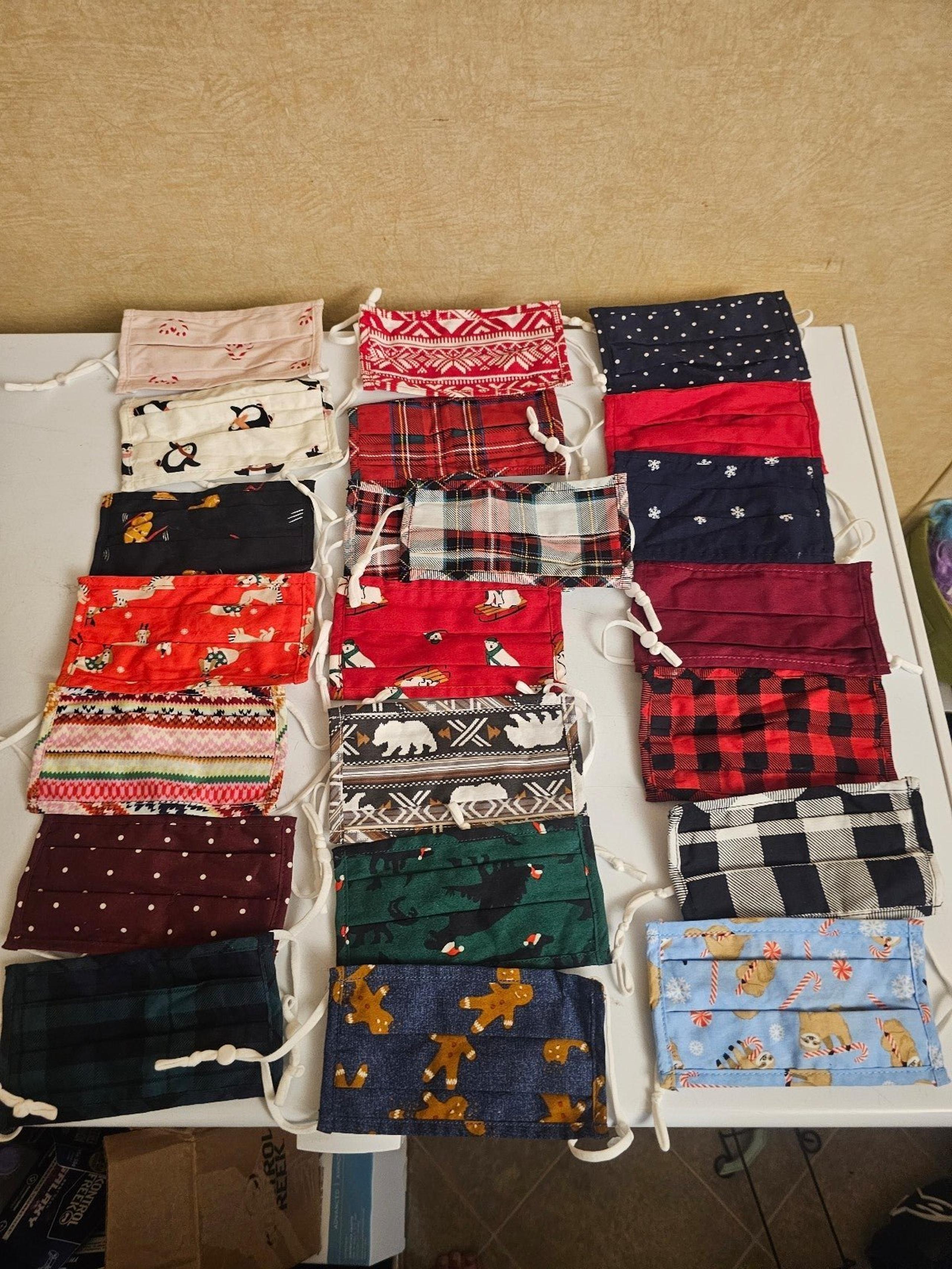 22 kids size face masks from old navy holiday and plain prints