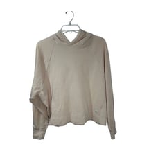 Vuori women’s pale peach hooded sweatshirt, size XS. #19-1938
