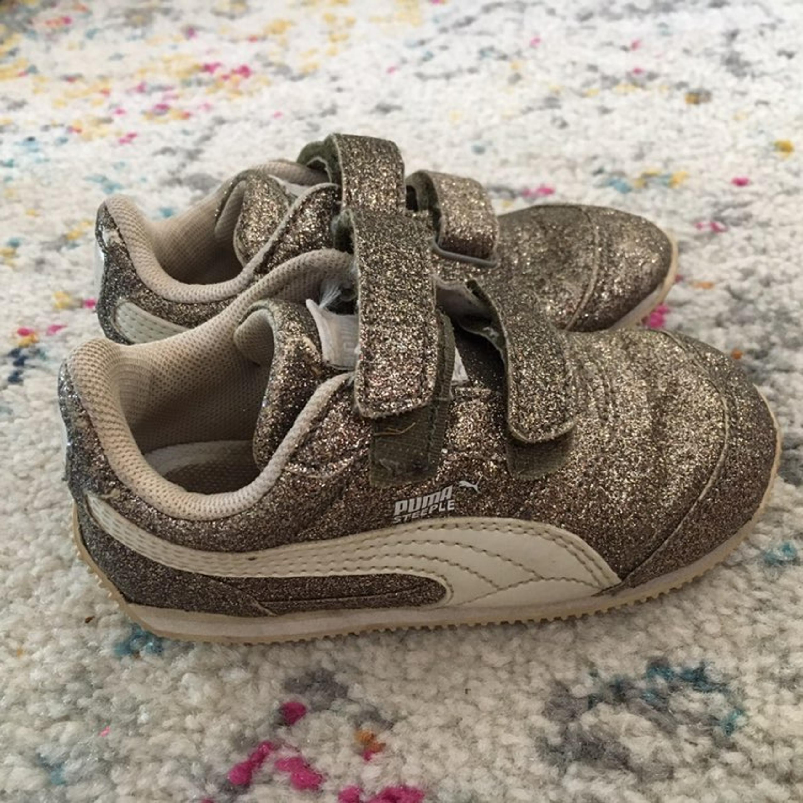 Gold girls puma tennis shoes size 7