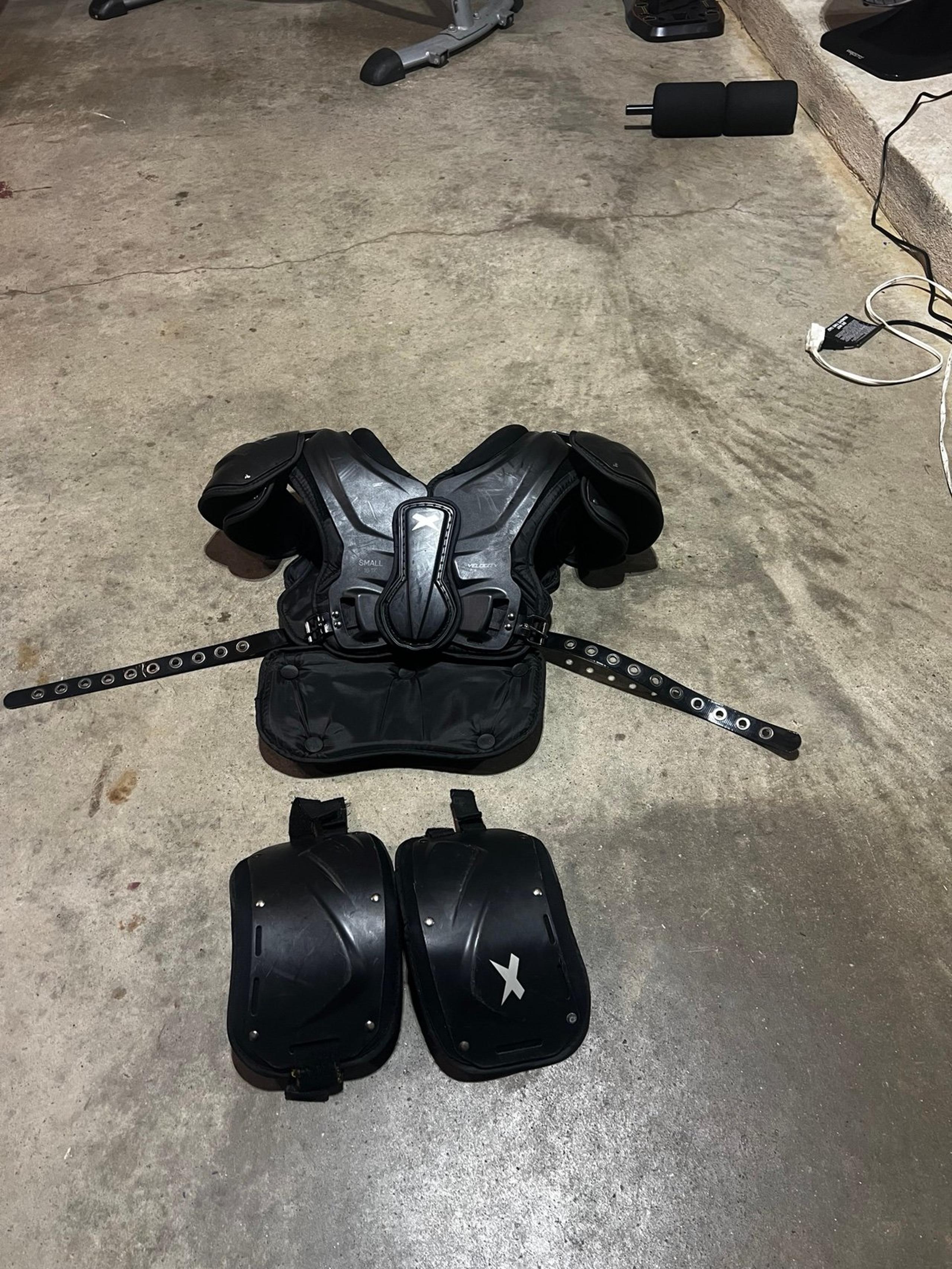 xenith shoulder pads with back plate and rib protectors