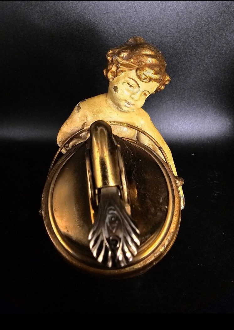 Art Deco/art nouveau brass/bronze cherub boys with a lighter and a basket - detail