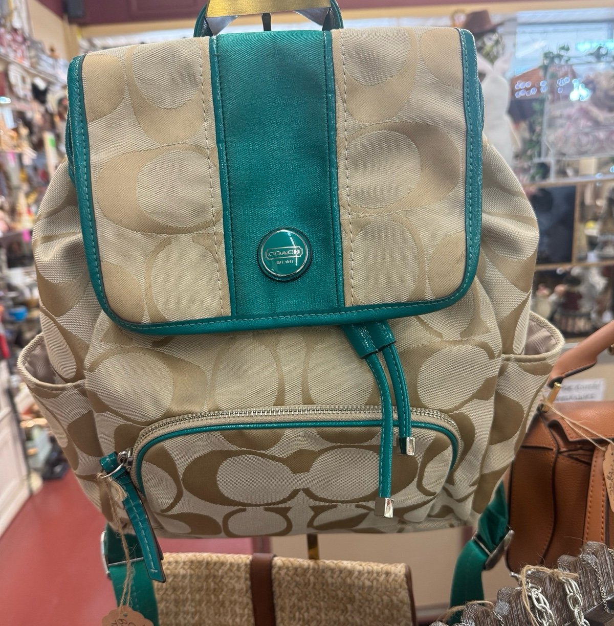 teal coach backpack