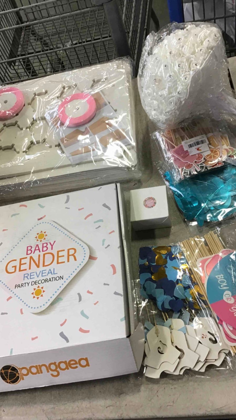Gender reveal decorations, pastry boxes,