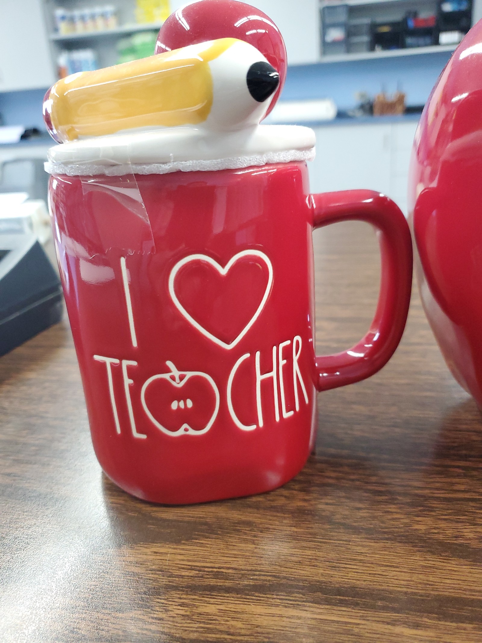 Rae Dunn teachermug plus a big red apple for desk.