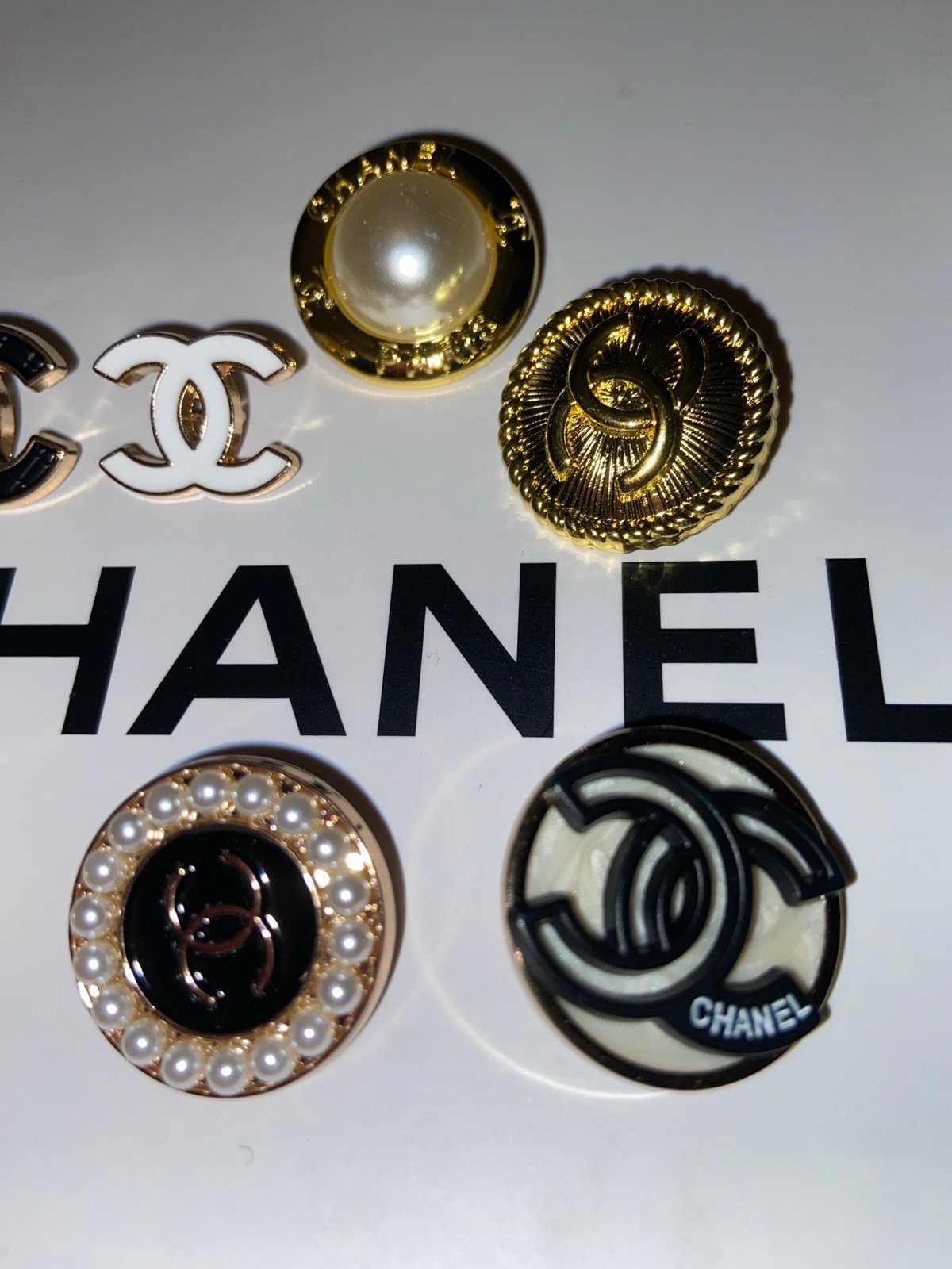 Seven piece mixed variety, Chanel button set